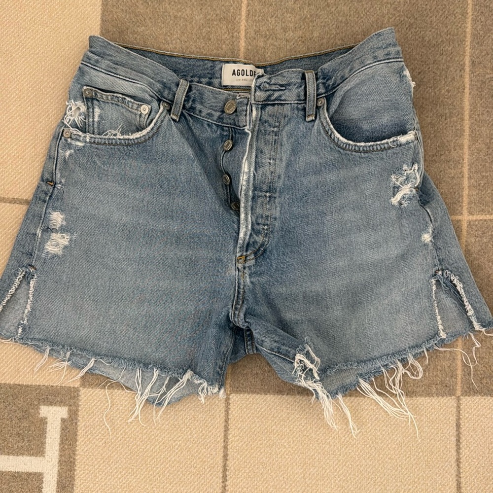 Agolde button fly distressed shorts
